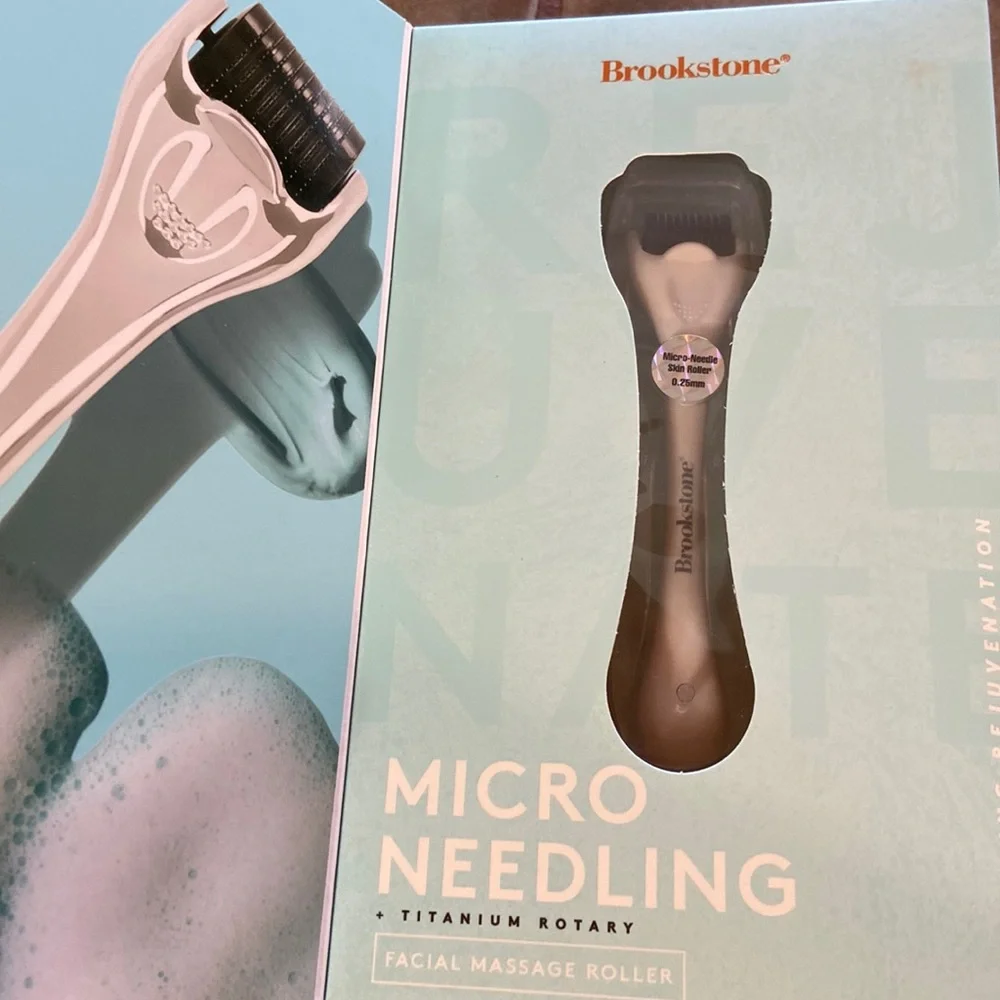 Brookstone Micro Needling Facial Massage Roller in White and Black